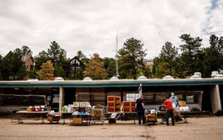 A stack of boxes of food awaiting distribution